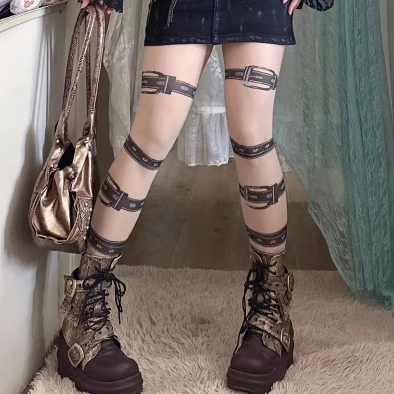 Beige buckle print tights styled with a dark skirt and lace-up boots, showing contrasting black belt graphics.