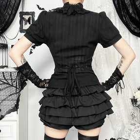 Back view of gothic ruffle blouse showing waist ties and short sleeves