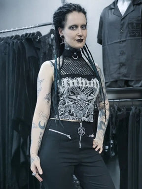 Graphic black fishnet-neck crop top styled with black trousers and a pentagram belt detail, showing the attached choker-style band.