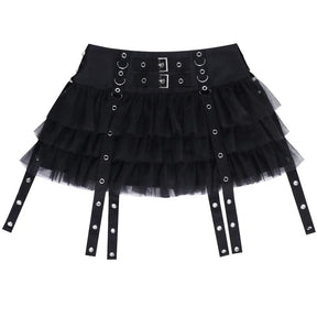 Front product view of the black eyelet strap mini skirt laid flat on white, with the ruffles and straps spread out.