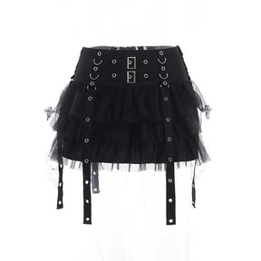 Straight front view of the black ruffle skirt on a clear mannequin, with two rectangular waistband buckles above the mesh tiers.