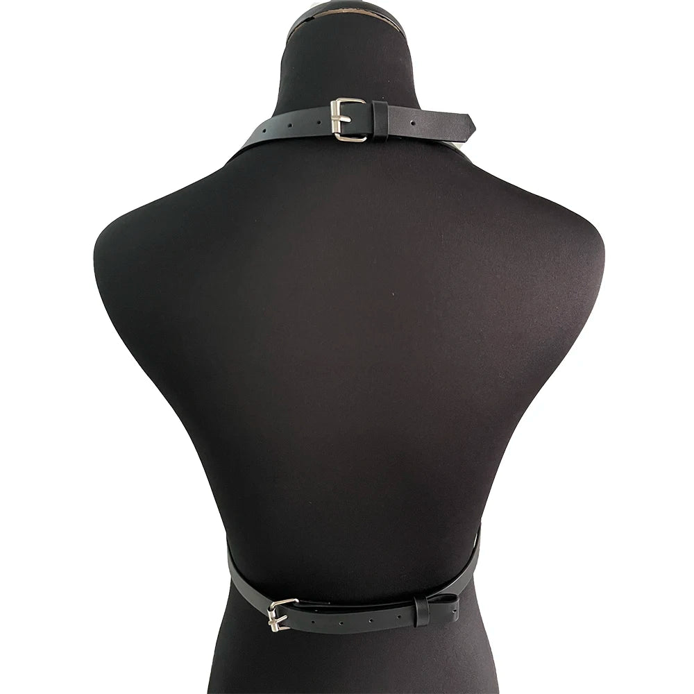 Rear view of the black harness and waist belt on a dress form, showing the rectangular buckles at the neck and waist.