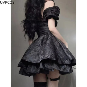 Back and side view of the black puff sleeve mini dress, showing its fitted bodice, floral jacquard outer skirt and lower ruffled layer.