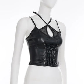 Black lace-up mesh halter crop top on a white mannequin from an angle, showing the keyhole opening and fitted front.