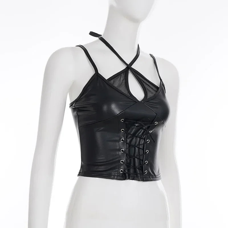 Black lace-up mesh halter crop top on a white mannequin from an angle, showing the keyhole opening and fitted front.