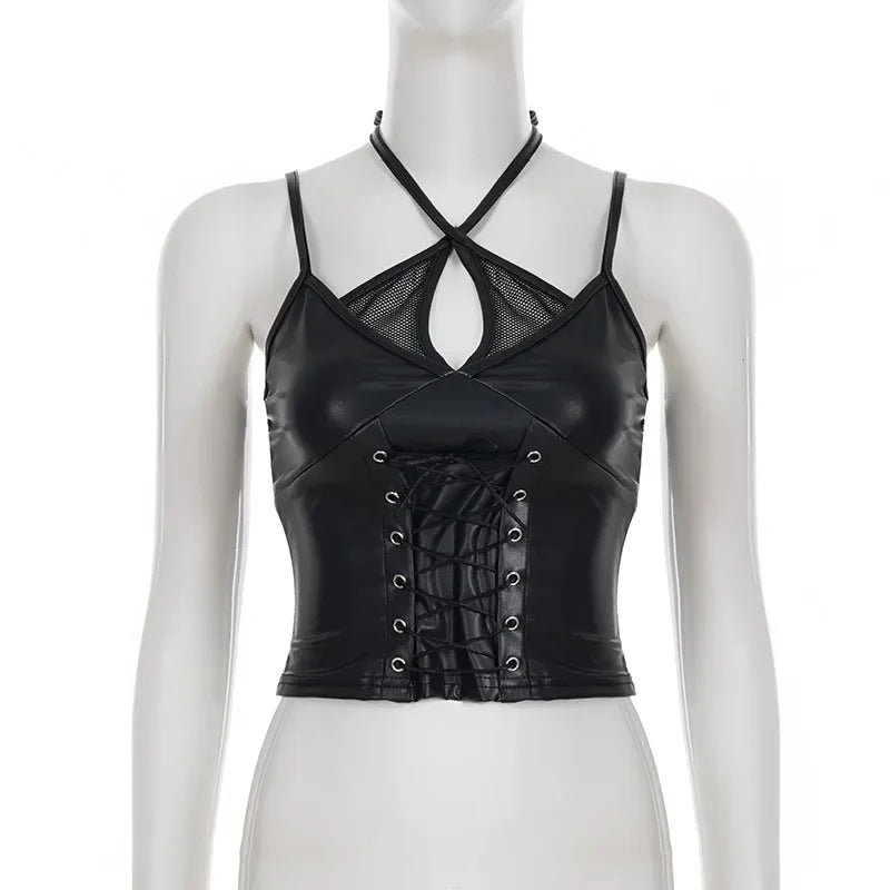 Straight front mannequin view of the black crop top with crossed halter ties, a mesh keyhole and central eyelet lacing.