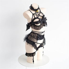 Angled mannequin view of the black pentagram lingerie set, showing the layered lace top and ruffled waist section from the side.
