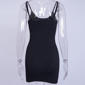 Rear mannequin view of the black pentagram bodycon dress, showing the plain back and slim adjustable shoulder straps.