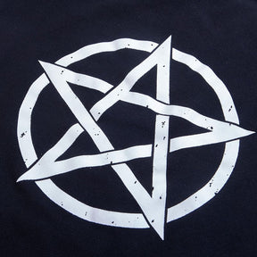 Detailed view of the distressed white pentagram and circular outline printed on the black gothic dress.