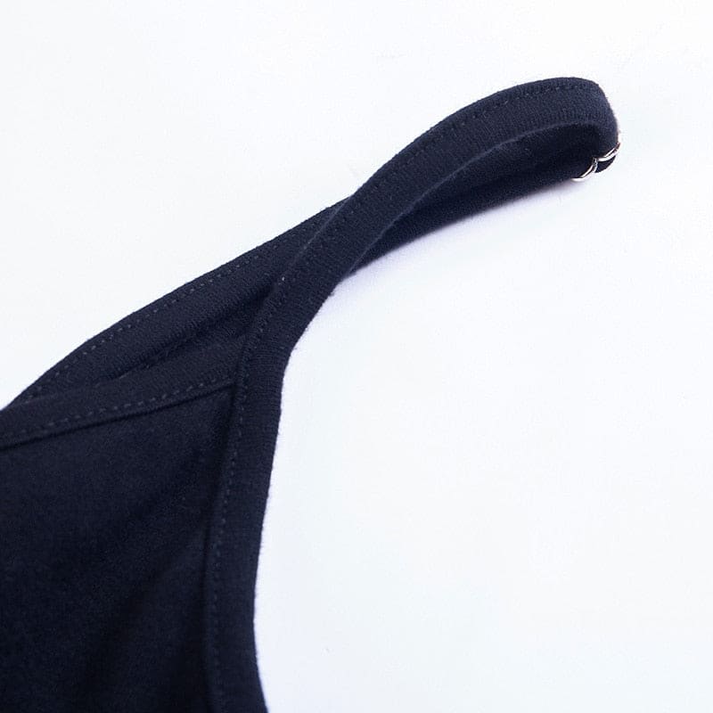 Close-up of a narrow black shoulder strap and small ring fitting on the pentagram bodycon dress.