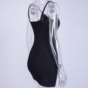 Side view of the black bodycon dress on a clear mannequin, showing the fitted waist and plain black side and back.