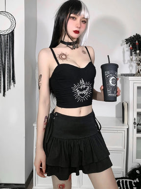 Mirror outfit photograph of the black tiered mini skirt styled with a black motif crop top and choker.
