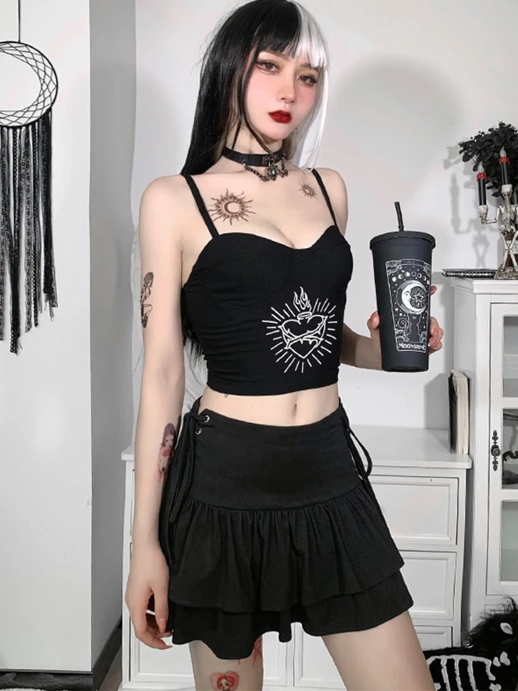 Mirror outfit photograph of the black tiered mini skirt styled with a black motif crop top and choker.