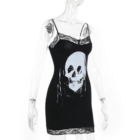 Angled mannequin view of the black skull dress, showing the fitted shape and lace-edged neckline against white.