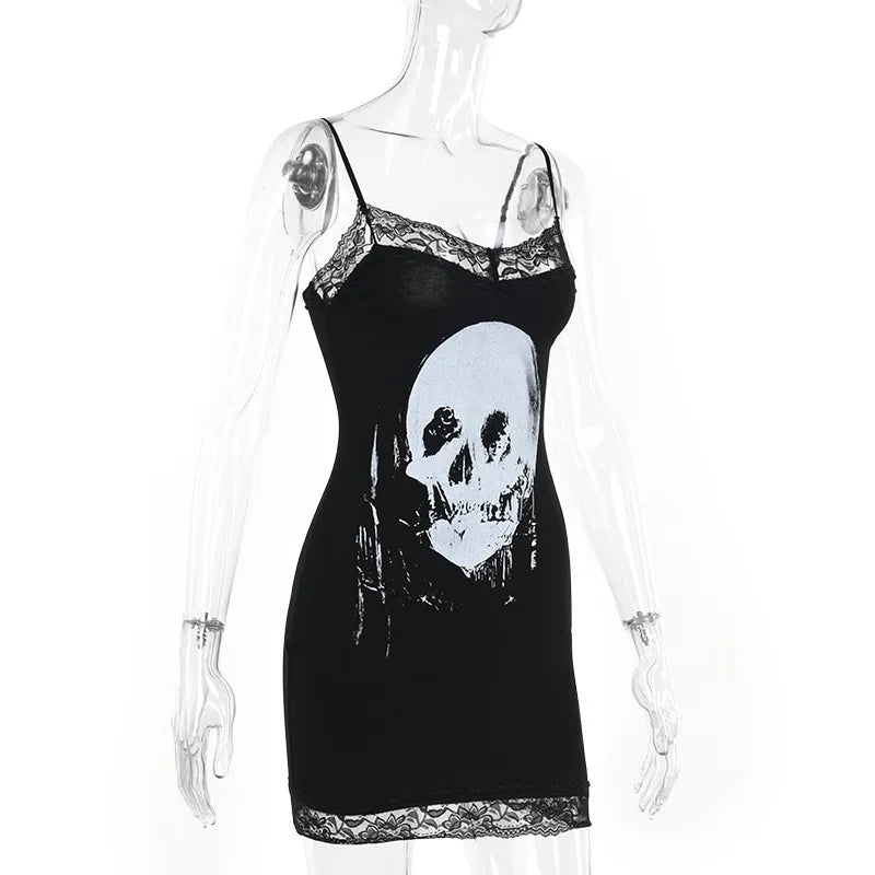 Angled mannequin view of the black skull dress, showing the fitted shape and lace-edged neckline against white.