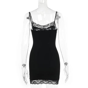 Rear mannequin view of the black lace-trimmed mini dress, with its plain back and narrow shoulder straps.