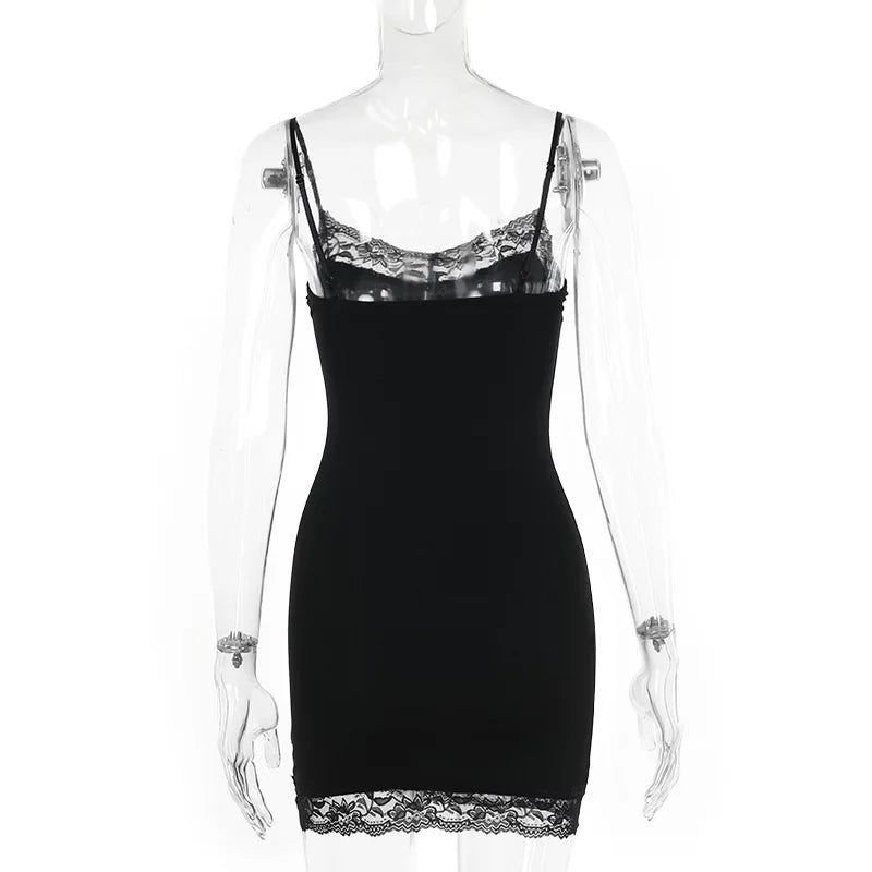 Rear mannequin view of the black lace-trimmed mini dress, with its plain back and narrow shoulder straps.