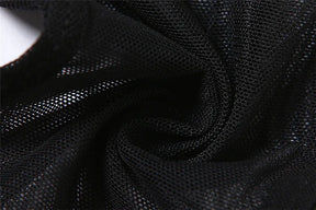 Close-up of the black halter top's fine mesh gathered into folds, showing the open net texture.