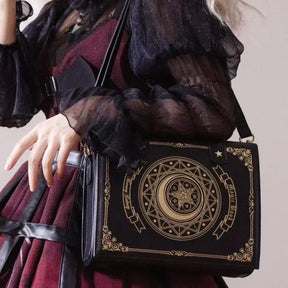 Black standard spellbook shoulder bag with celestial front design