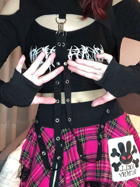 Black lace-up corset top with white gothic embroidery and silver eyelets featuring fitted sleeves and hooded shrug style