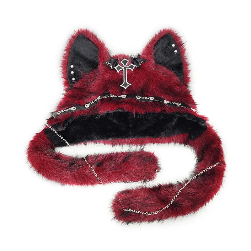 Burgundy gothic cat ear hat on a white background with a bat-wing cross, ear studs and decorative chains.