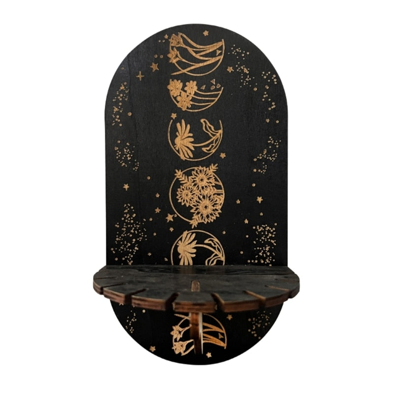 Floral Spheres shelf showing five gold-tone botanical circles down a black arched panel above a small notched ledge.