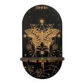 Giant Moth shelf design with a detailed gold-tone moth, geometric lines and small stars printed on a black rounded panel.