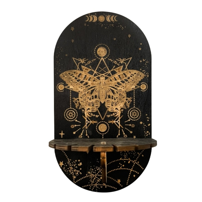 Giant Moth shelf design with a detailed gold-tone moth, geometric lines and small stars printed on a black rounded panel.