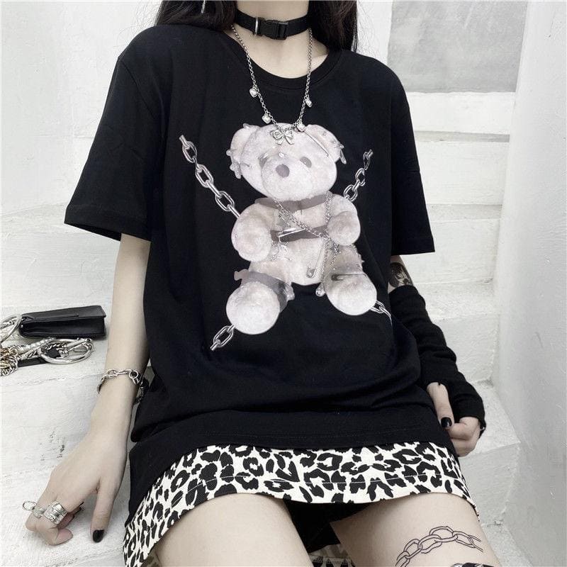 Black short-sleeved teddy bear tee with silver chains and metallic accessories perfect for dark fashion fans