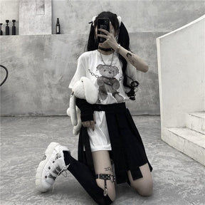 White t-shirt featuring a teddy bear print with chain details perfect for dark fashion looks