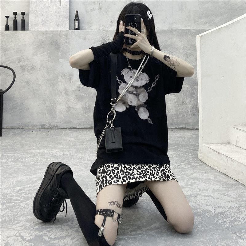Black chain strap crossbody bag with silver hardware and rectangular flap perfect for dark fashion teddy bear looks