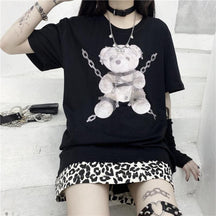 Black short-sleeved tee with gray teddy bear graphic featuring silver chains and metallic accents for dark fashion fans