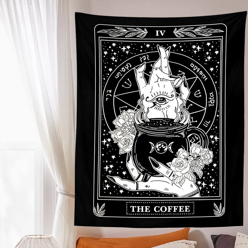 Black-and-white Coffee wall tapestry displayed above a bed, creating a high-contrast card-like focal point beside a window.