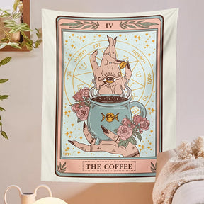 Pastel Coffee tapestry on a pale wall beside greenery and soft bedding, with the card-style illustration fully visible.
