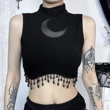 Front detail of the sheer moon inset and black bead fringe on a witchy crop top