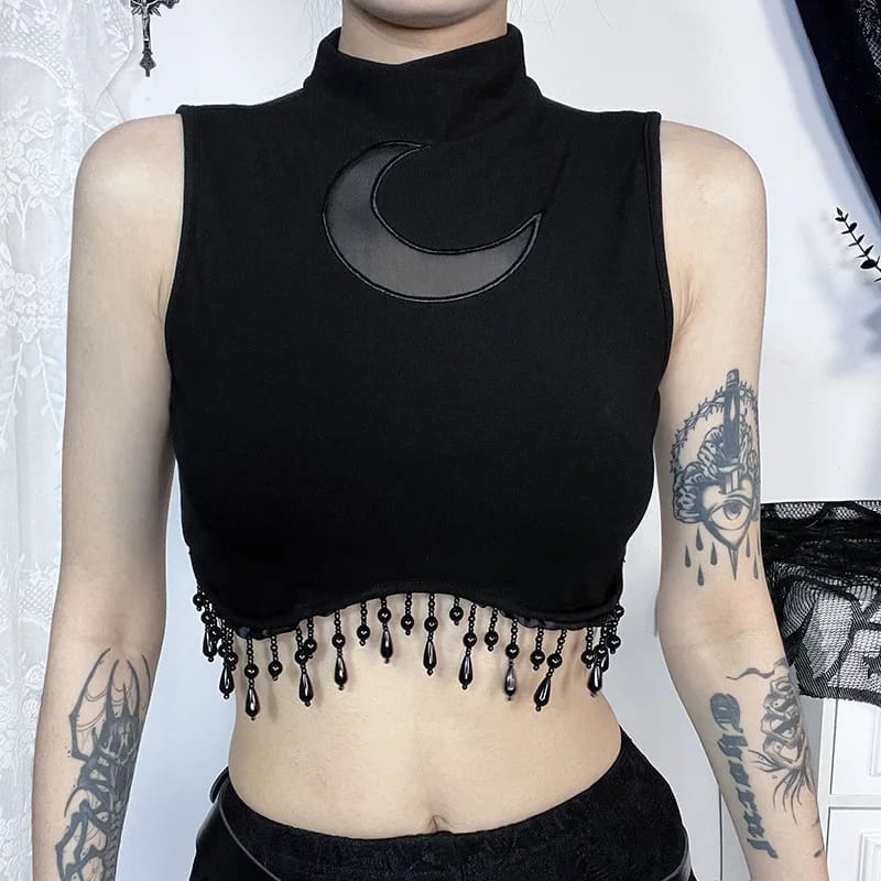 Front detail of the sheer moon inset and black bead fringe on a witchy crop top