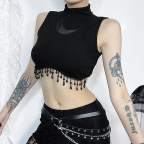 Side view of the crescent moon crop top showing the high neckline and beaded hem
