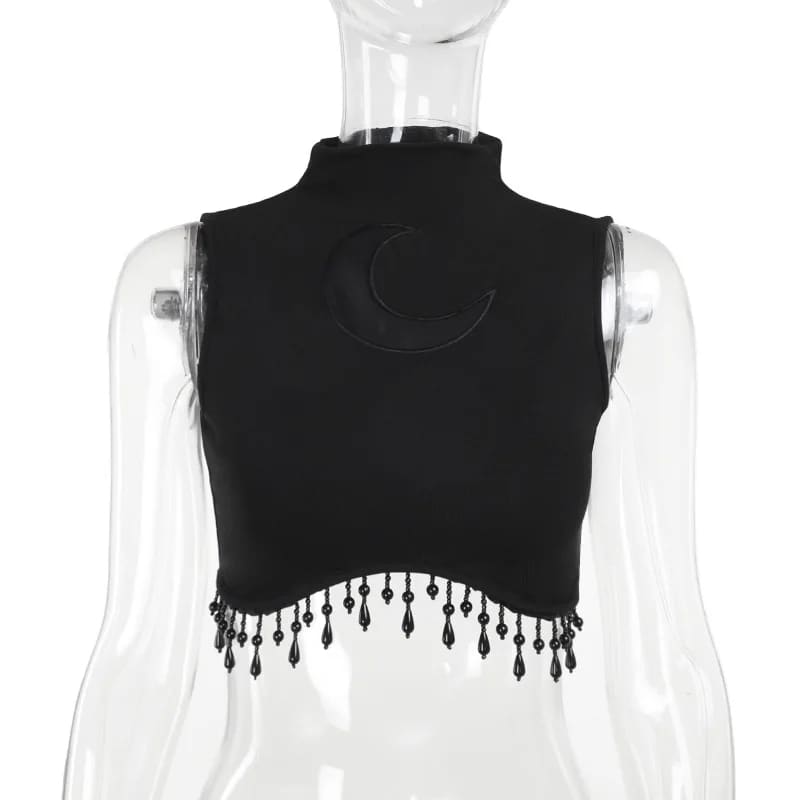Crescent moon crop top on a mannequin showing the sheer inset and teardrop bead fringe