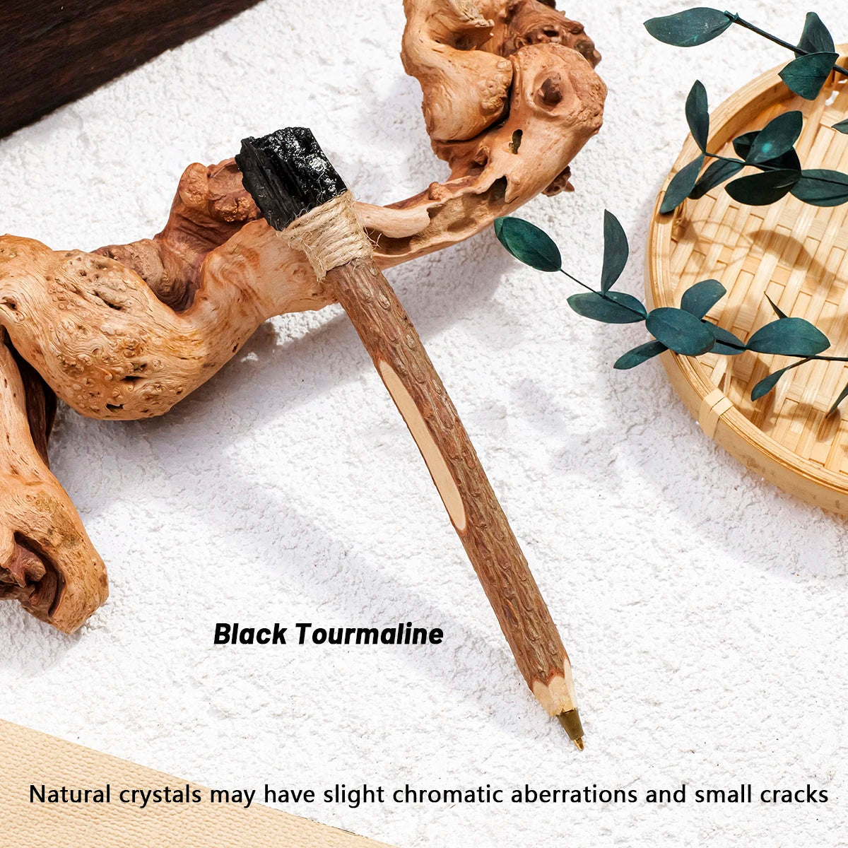 Black crystal topper on a witchy branch-style ballpoint pen