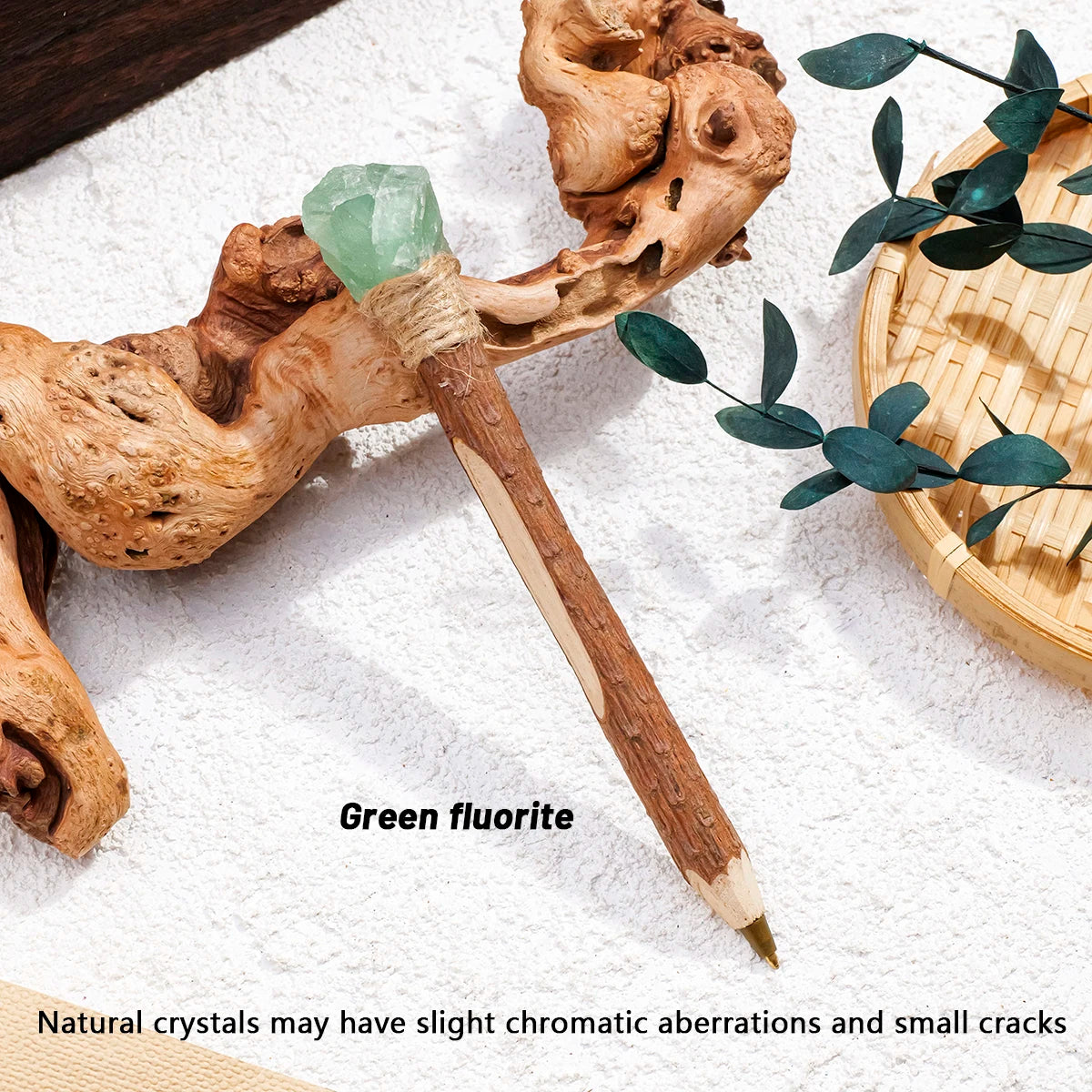 Green crystal topped ballpoint pen with a wrapped collar and textured barrel