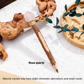 Pink crystal topped wand pen with a wrapped collar