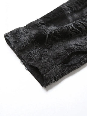 Close-up of distressed sleeve texture on gothic hooded crop top