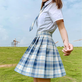 A pleated blue and white plaid skirt with a matching waistband from the electric plaid skirt color options perfect for school girl style