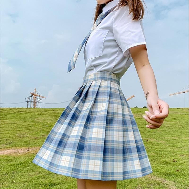 A pleated blue and white plaid skirt with a matching waistband from the electric plaid skirt color options perfect for school girl style