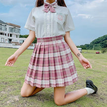 Pink and white plaid skirt with pleats showing color options perfect for a cute school girl look