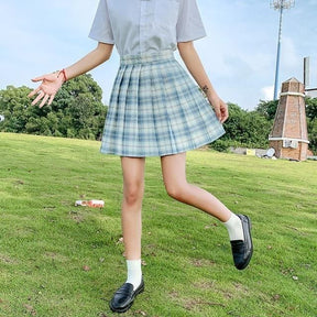 Pleated blue and white plaid skirt with fitted waistband perfect for a school girl look with 17 color options