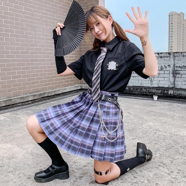 Black and purple plaid skirt with pleats and silver chain belt detail in school girl style with multiple color options
