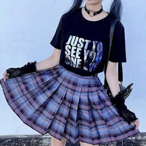 Electric plaid skirt in blue and purple classic tartan pleated design with multiple color options for a school girl look