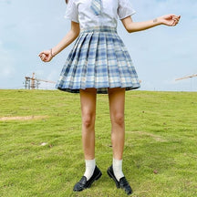 Pleated blue and white plaid skirt with fitted waistband in electric plaid skirt with 17 color options perfect for school girl looks