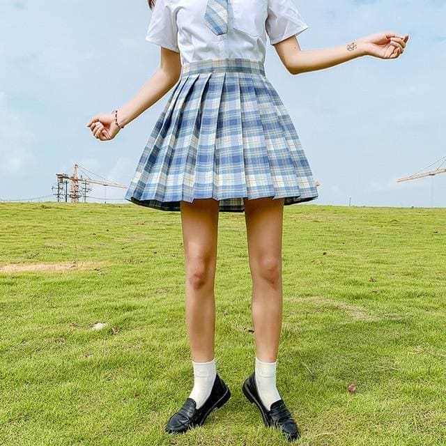Pleated blue and white plaid skirt with fitted waistband in electric plaid skirt with 17 color options perfect for school girl looks